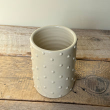 Load image into Gallery viewer, Ivory ceramic utensil holder with a  raised dot pattern