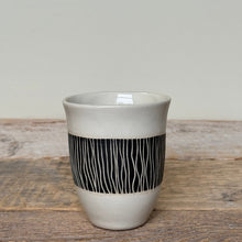 Load image into Gallery viewer, Ceramic cup with black pattern on a wooden surface