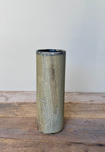Load image into Gallery viewer, Cylindrical ceramic vase with textured surface on a wooden surface