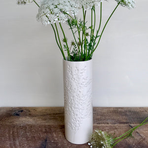 IVORY CYLINDER VASE WITH BRANCHES