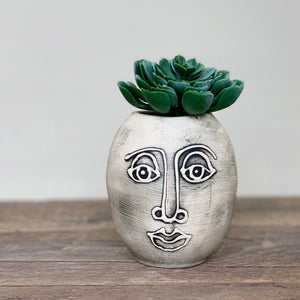 TWO FACED VASE