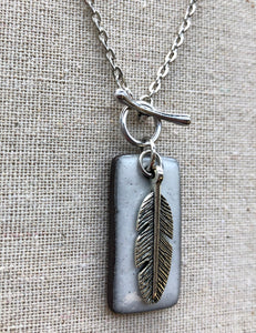 WHITE FEATHER CHARM NECKLACE