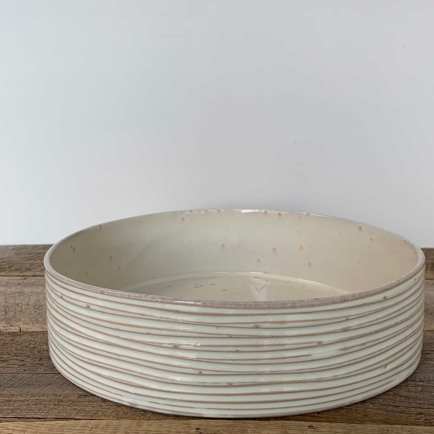 CYLINDER BOWL IN OATMEAL WITH WAVES-LARGE