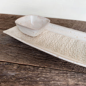 SMALL SKINNY PLATTER SET IN OATMEAL WITH PEBBLES